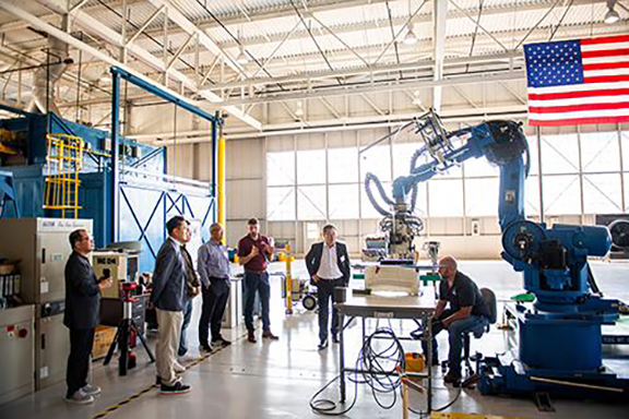 Mississippi State representatives lead a tour of the university’s Advanced Composites Institute