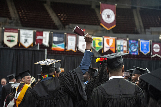 New MSU graduate rings a cowbell to celebrate