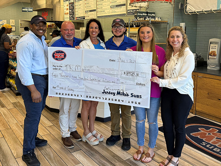 Starkville’s Jersey Mike’s Subs presented Mississippi State University’s T.K. Martin Center a donation