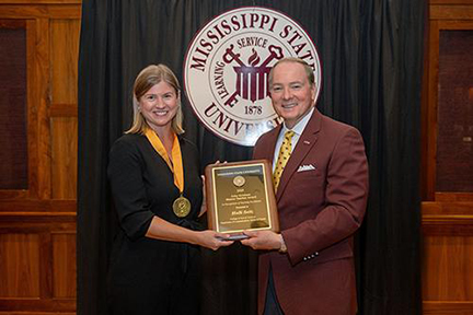 Holli Seitz and Mark E. Keenum Holli Seitz and Mark E. Keenum