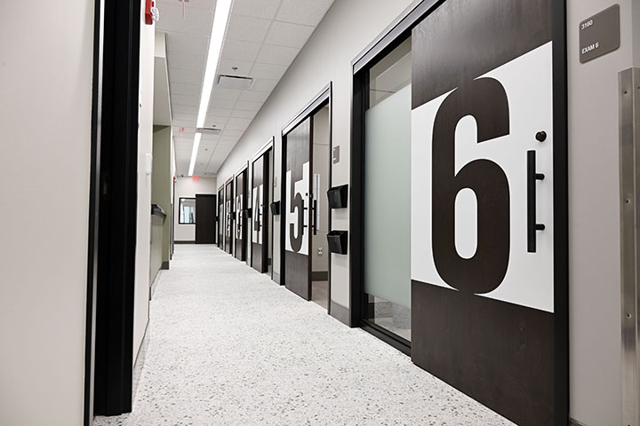 MSU-Meridian’s Interprofessional Simulation Center hallway showing exam rooms