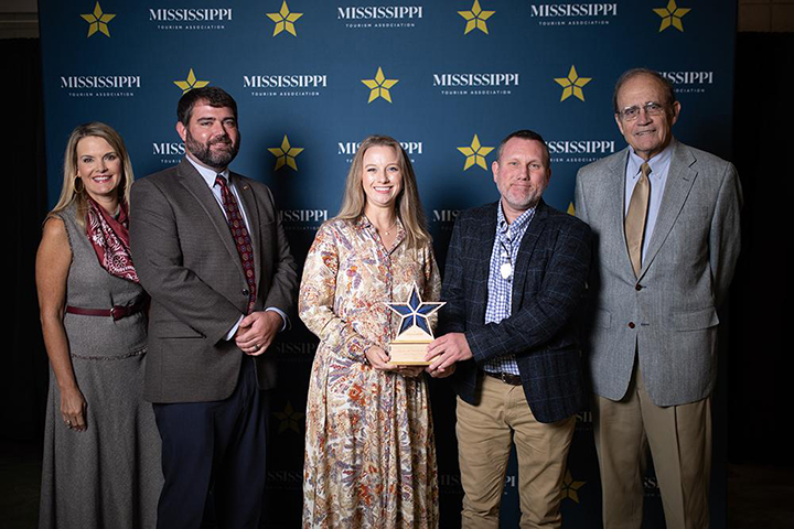 Pictured with the award title=