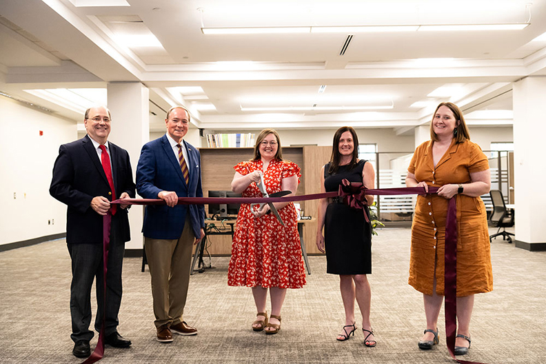 MSU leaders celebrate the ribbon cutting for the university's Writing Center